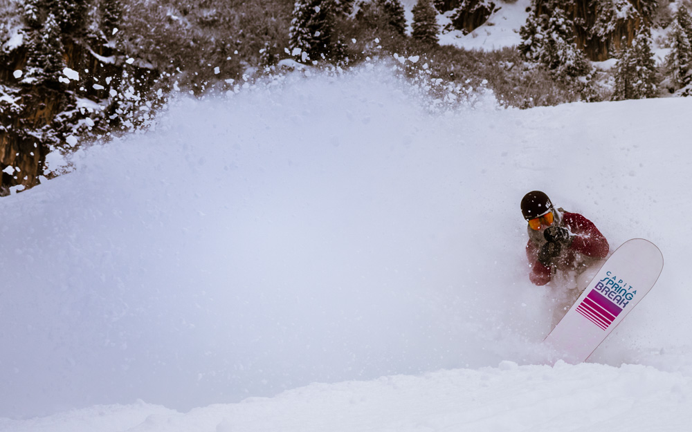 Photo of someone snowboarding