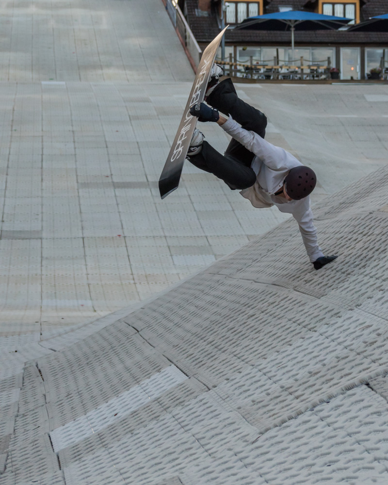 Photo of someone snowboarding