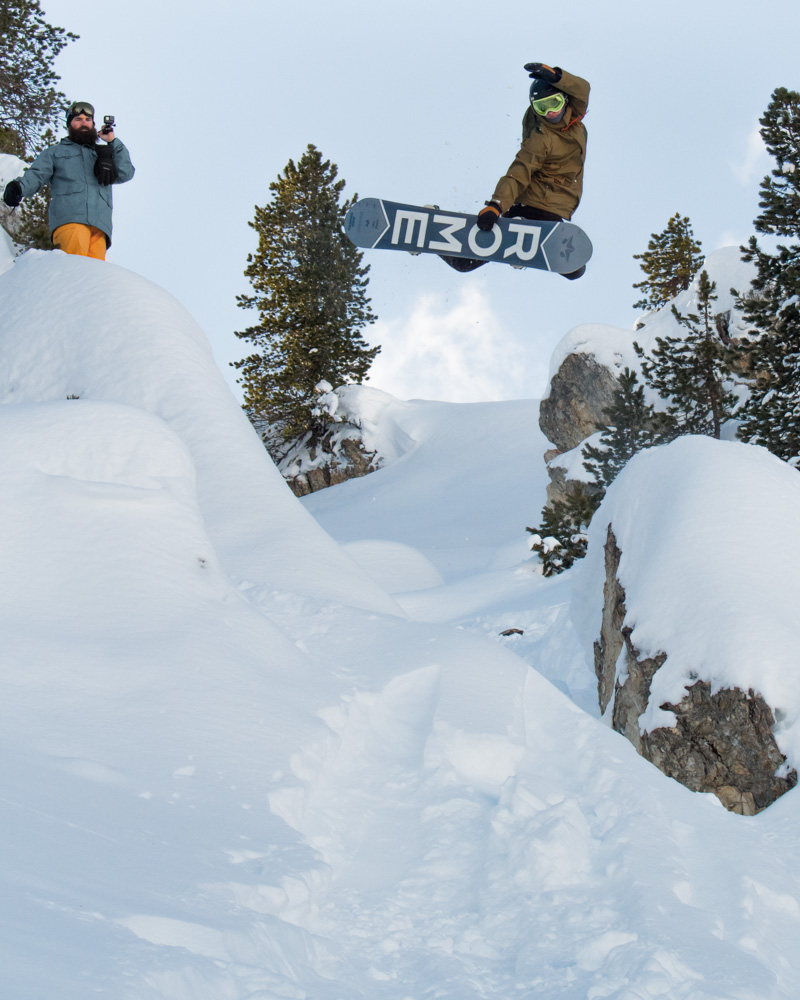 Photo of someone snowboarding