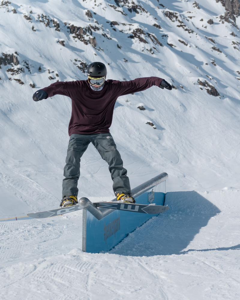 Photo of someone snowboarding