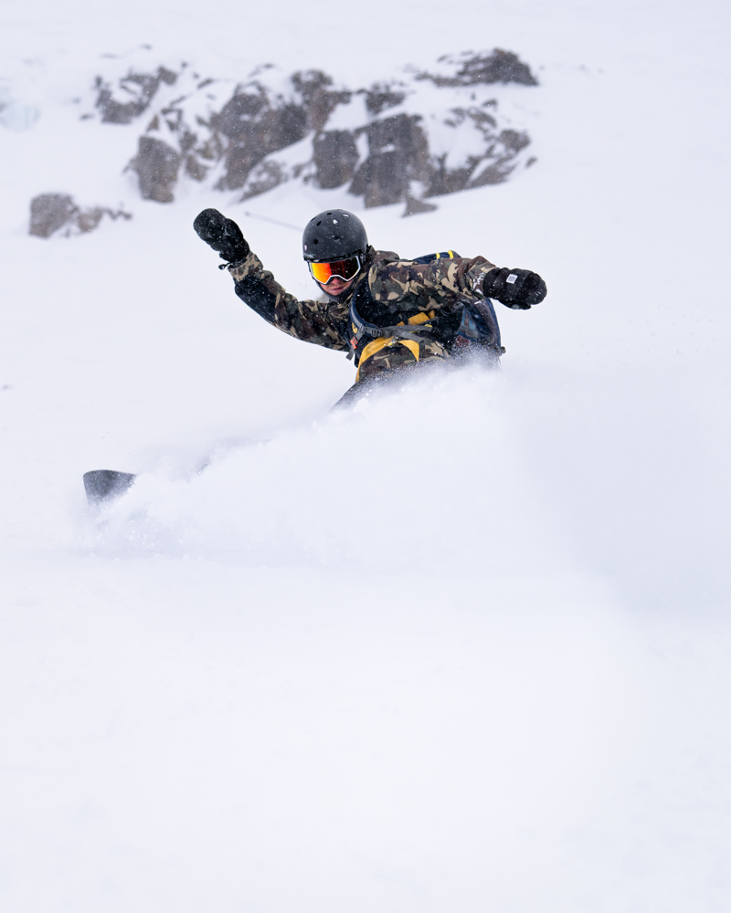 Photo of someone snowboarding