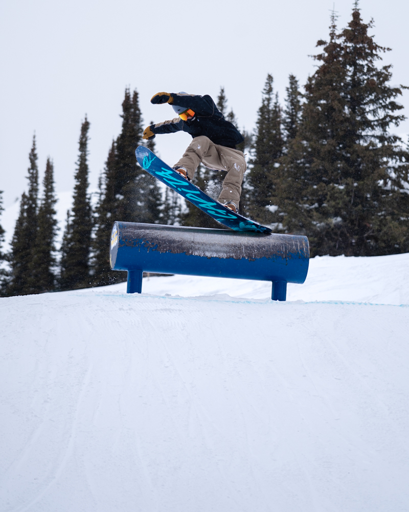 Photo of someone snowboarding