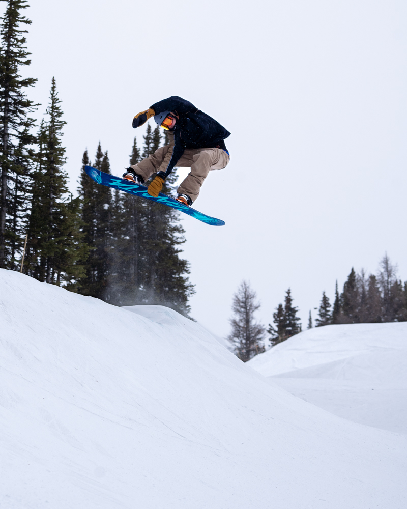 Photo of someone snowboarding