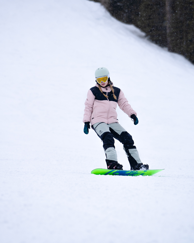 Photo of someone snowboarding