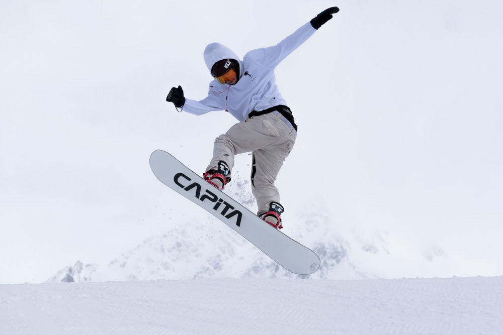 Photo of someone snowboarding