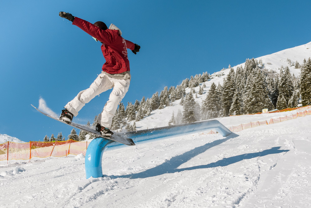 Photo of someone snowboarding